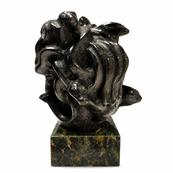 Bring mystical beauty to your space with this Labradorite Medusa Statue, featuring a polished dark stone finish and distinctive sculptural details. Labradorite is admired for its natural iridescent play-of-color and is traditionally associated with intuition, transformation, protection, and spiritual awareness.